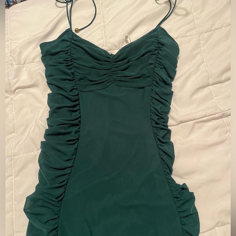 Gorgeous, dark green dress. Women’s size medium. Never been worn new with tags.